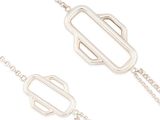 a close up of two silver bracelets on a white background