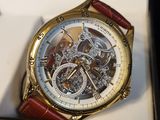 a watch that is in a box on the table