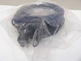 a stuffed animal in a plastic bag on a table