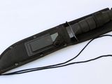 a knife that is laying on top of a black case