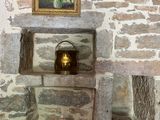 a painting on the wall of a room with a pot and a teapot