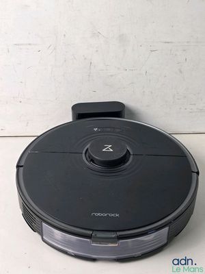 an image of a robotic vacuum cleaner sitting on top of a counter