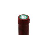 a bottle of wine that is sitting on a table