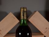 a bottle of wine that is sitting on a table