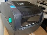 a printer that is sitting on top of a box