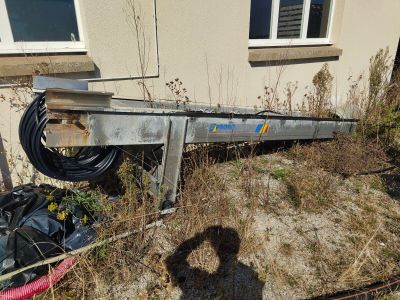 a large metal object that is laying in the grass