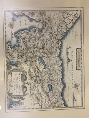 an old map of scotland in a frame on a wall
