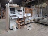 an image of a work area with a computer and other equipment