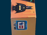 a box with a batman figure inside of it