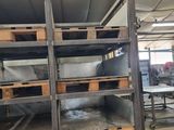 a rack of food that is sitting in the middle of a room