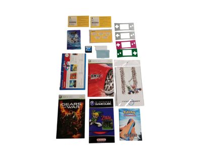 Lot d'objets divers relatifs à l'univers NINTENDO dont des notices, fa