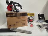 a box with a chainsaw and other items on a table
