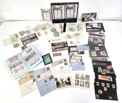 a lot of stamps and postcards sitting on a table