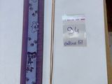 a picture of a piece of paper and a ruler on a table