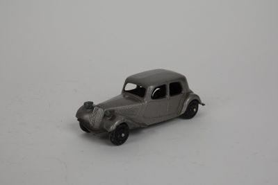 a toy car that is sitting on a white surface