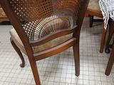 a chair that is sitting in the middle of a room