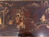 une image d'un tableau sur le mur d'une pièce