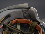 a close up of a helmet with a strap on it