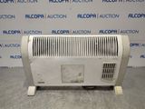 a white electric heater sitting on top of a table