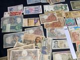 many different types of currency on the table