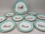 seven blue and white plates with a picture of a horse drawn carriage on them