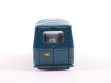 a small toy van that is sitting on a white surface