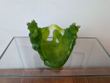 a glass table with a green object on top of it