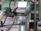 a machine that is sitting in a room with wood