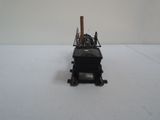 a toy train on a white surface with a white background