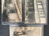 three old black and white photos of people standing on a train track