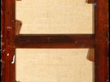 an old wooden picture frame with a picture of a cat on it
