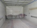an image of a room with a lot of paint on the walls