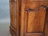 a wooden cabinet with a marble top on a white background