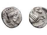 two ancient silver coins with a crown on top of them
