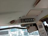 a view of the inside of a vehicle from the driver ' s seat
