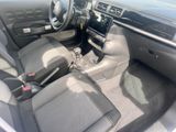 a picture of a car that is sitting in a lot