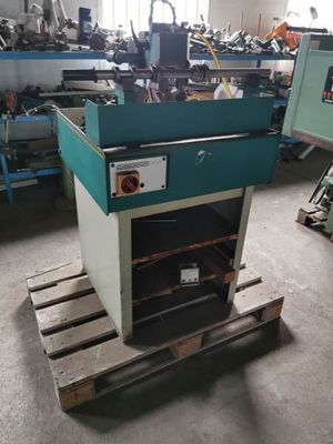 a machine that is sitting on a pallet in a room
