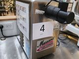 a machine that is sitting on a table in a store