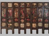 an image of a room divider with oriental paintings on it