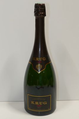an image of a bottle of champagne on a table