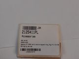 a label on a piece of paper on a bed