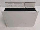 a close up of a white box with a printer on it