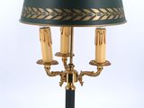 an image of a table lamp with a green shade on it