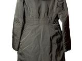 an image of a woman ' s jacket on a hanger on a white background