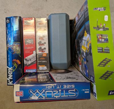 a lot of legos that are sitting on the floor