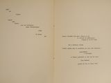 an open book with a poem written on it
