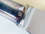 a knife that is sitting on top of a table