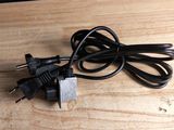 a cord that is plugged into a power supply