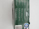 a box of toothpaste sitting on a white surface