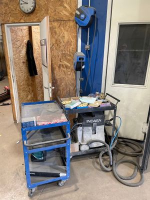 a small work station with a clock on the wall